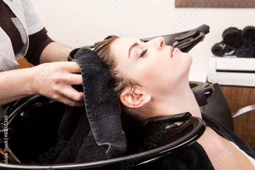 woman washing her hair in hairsalon