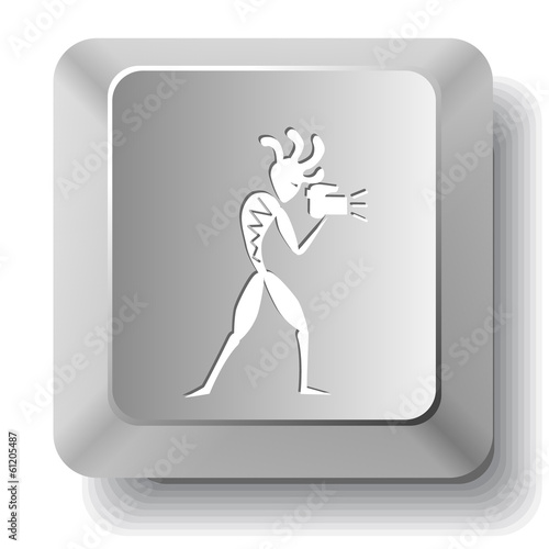 Ethnic little man with camera. Vector computer key.