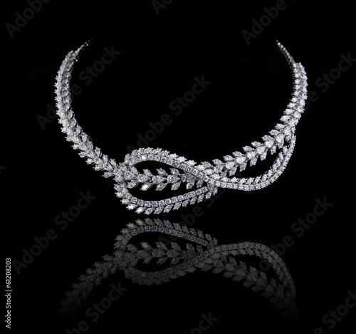 Diamond necklace shot against a black background
