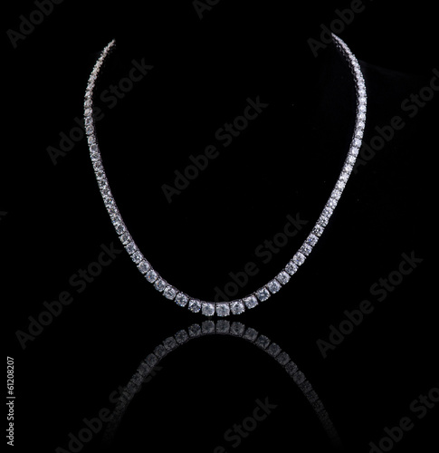 Diamond necklace shot against a black background