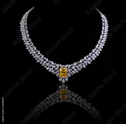 Fotografie, Obraz Diamond necklace shot against a black background