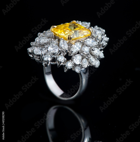 Diamond ring shot on a black reflective background