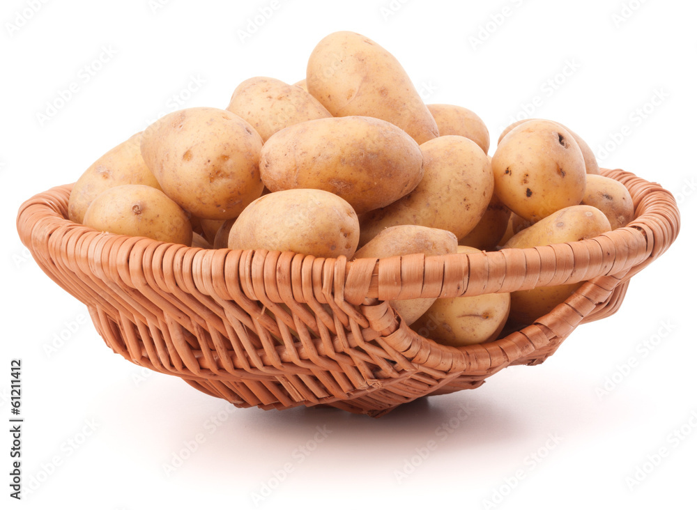 Potato tuber in wicker basket isolated on white background Potato tuber in wicker basket isolated on white background