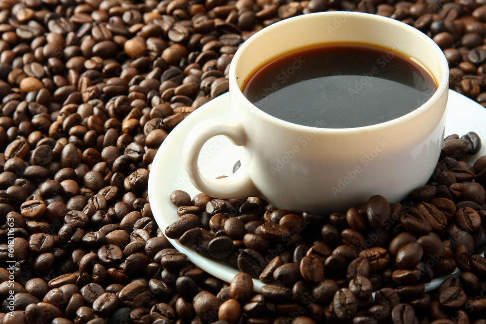 coffee beans with white cup. coffee beans with white cup.