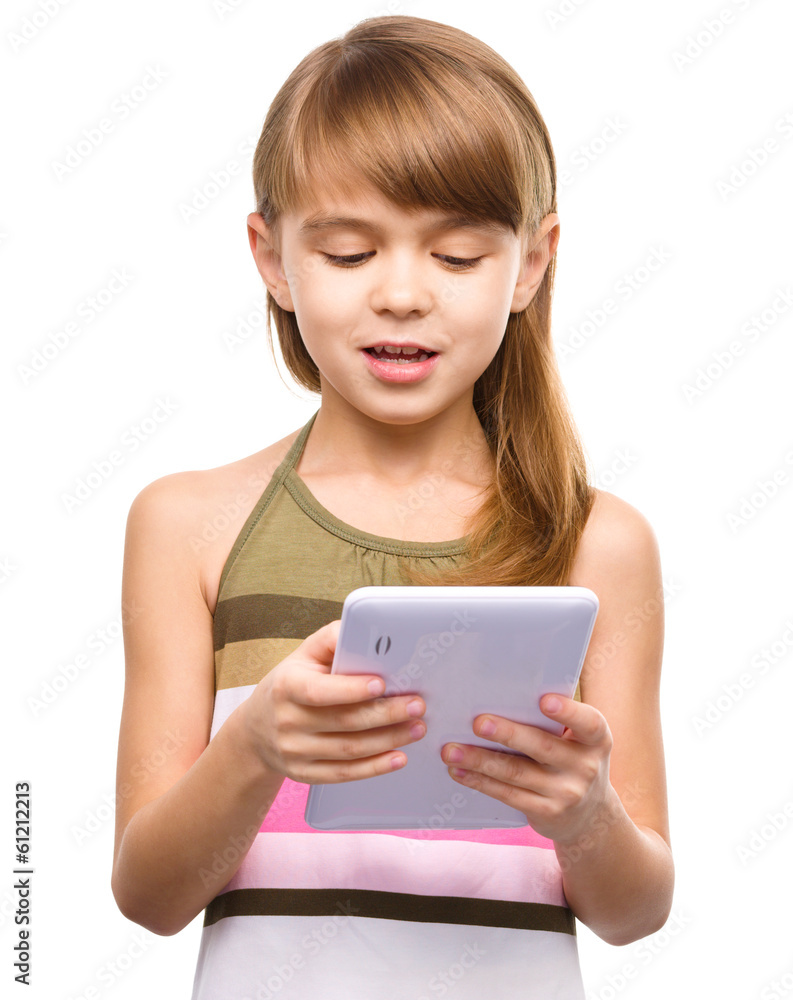 Young girl is using tablet