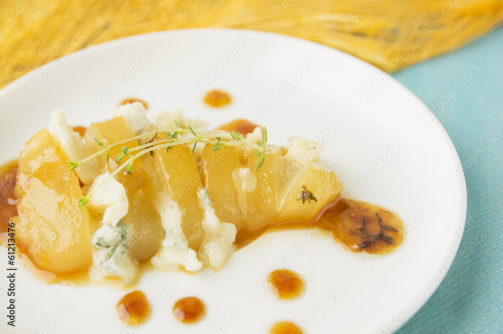 Caramelized pear slices cutting with gorgonzola Caramelized pear slices cutting with gorgonzola