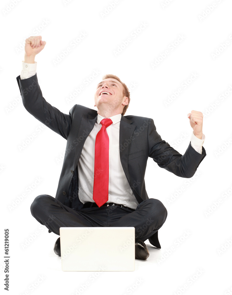 Portrait of a happy young businessman working on laptop Portrait of a happy young businessman working on laptop
