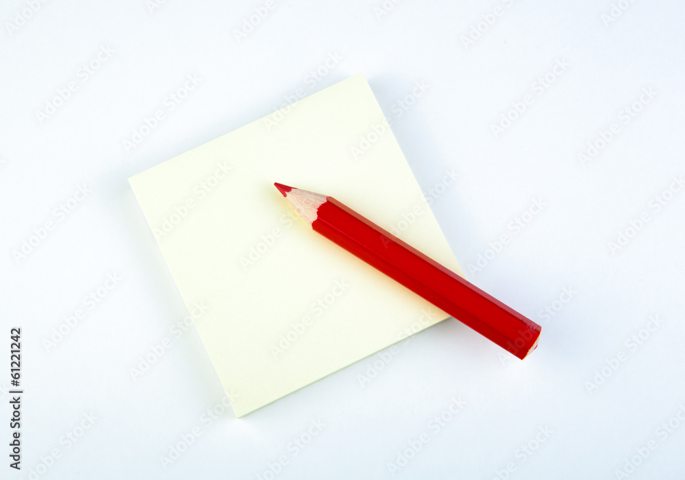 sheet of paper with red pencil sheet of paper with red pencil
