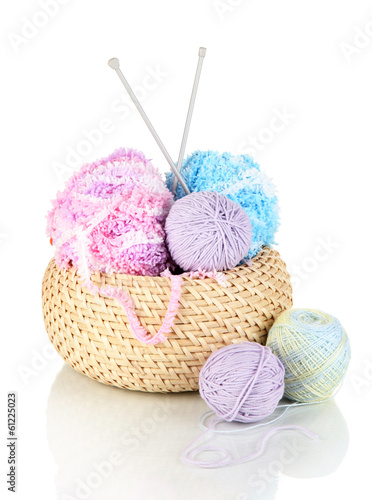 Colorful yarn for knitting in basket isolated on white