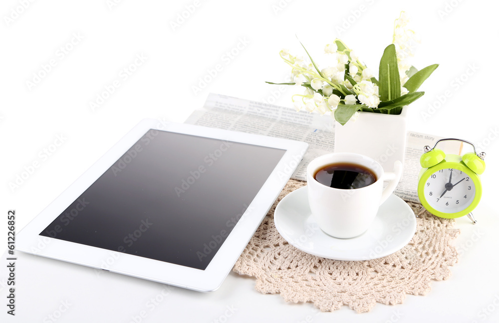 Tablet, newspaper, cup of coffee and alarm clock, isolated Tablet, newspaper, cup of coffee and alarm clock, isolated