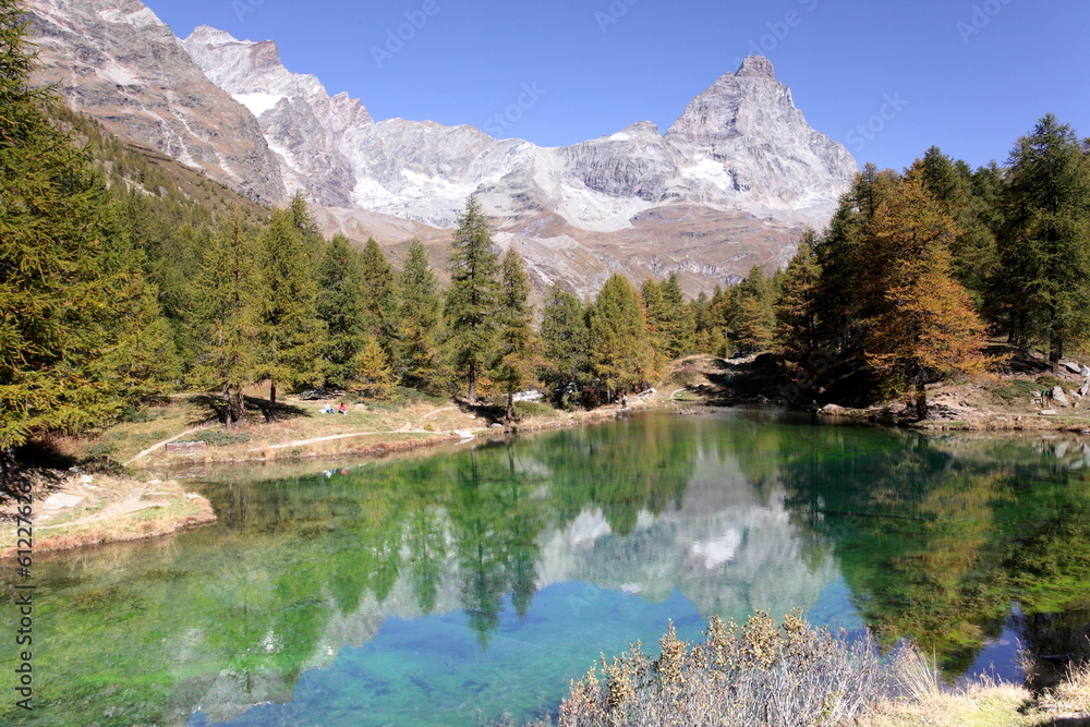 alpine landscape at Lake Blue of Breuil-Cervinia at the foot of Matterhorn in autumn, Italy