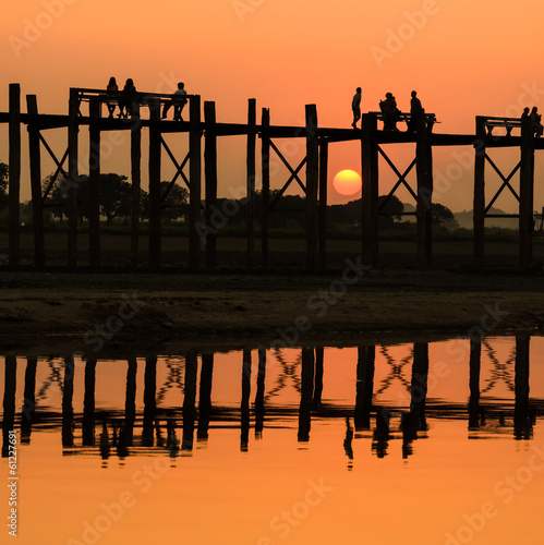 U Bein bridge at sunset in Amarapura , Myanmar