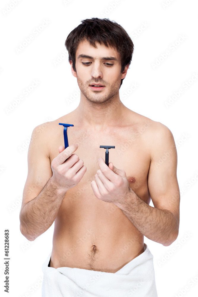 happy young man with the towel around his waist happy young man with the towel around his waist