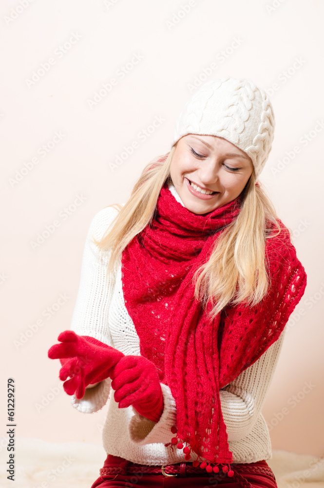 pretty happy woman wearing red knitted scarf and gloves pretty happy woman wearing red knitted scarf and gloves