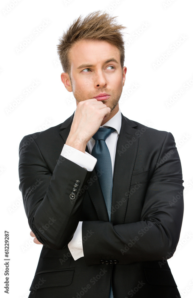 Half-length portrait of pensive businessman touching face Half-length portrait of pensive businessman touching face