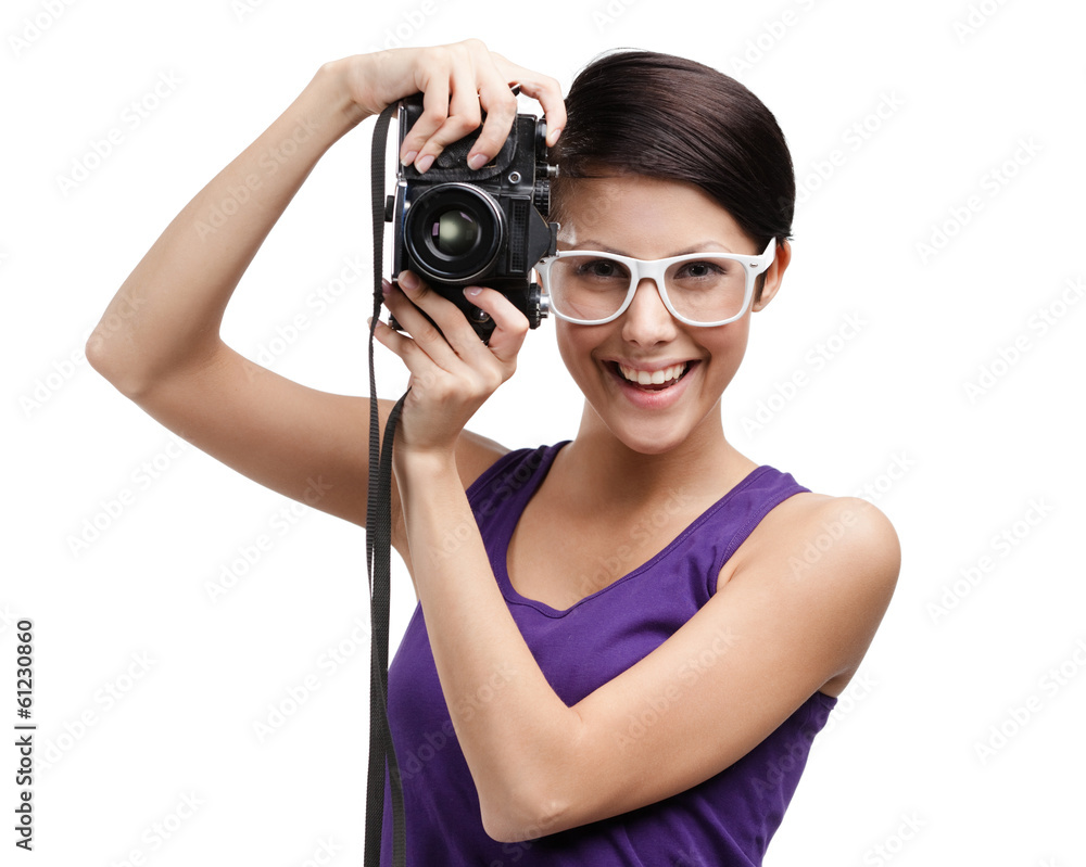 Girl in spectacles hands professional photographic camera Girl in spectacles hands professional photographic camera
