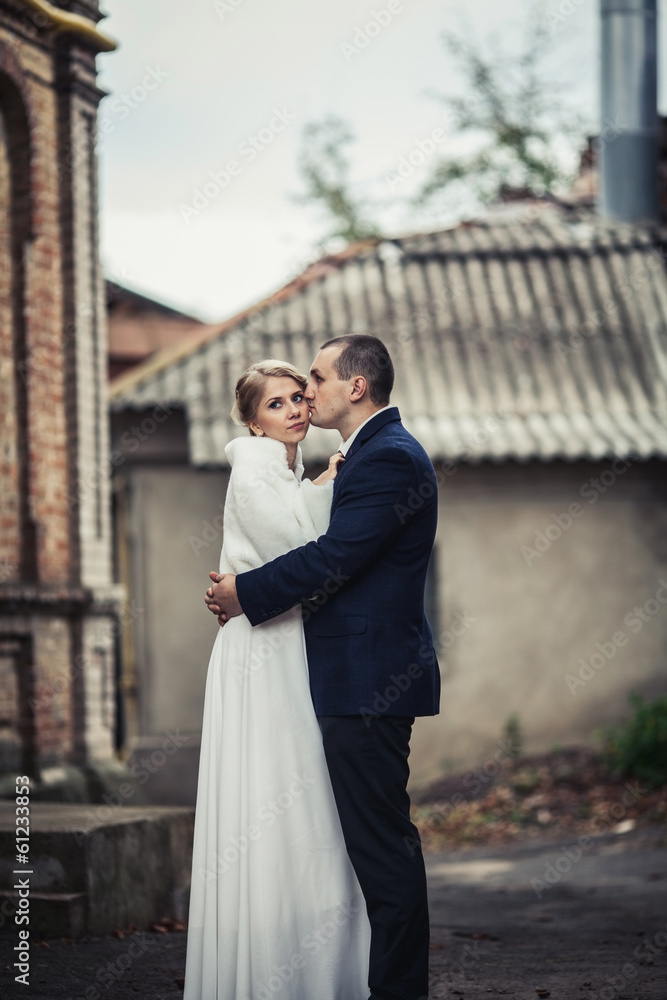 wedding. couple embracing in city wedding. couple embracing in city