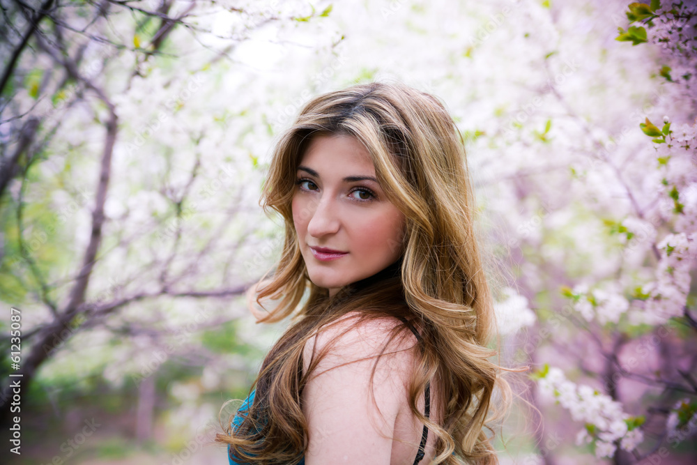 Beautiful young woman with flowers. Beautiful young woman with flowers.