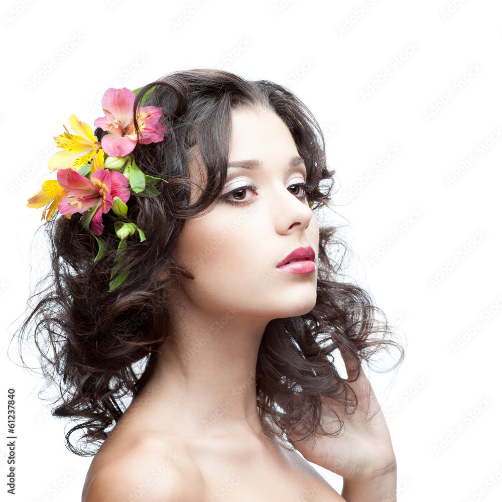Naklejka premium young woman with flower in hair
