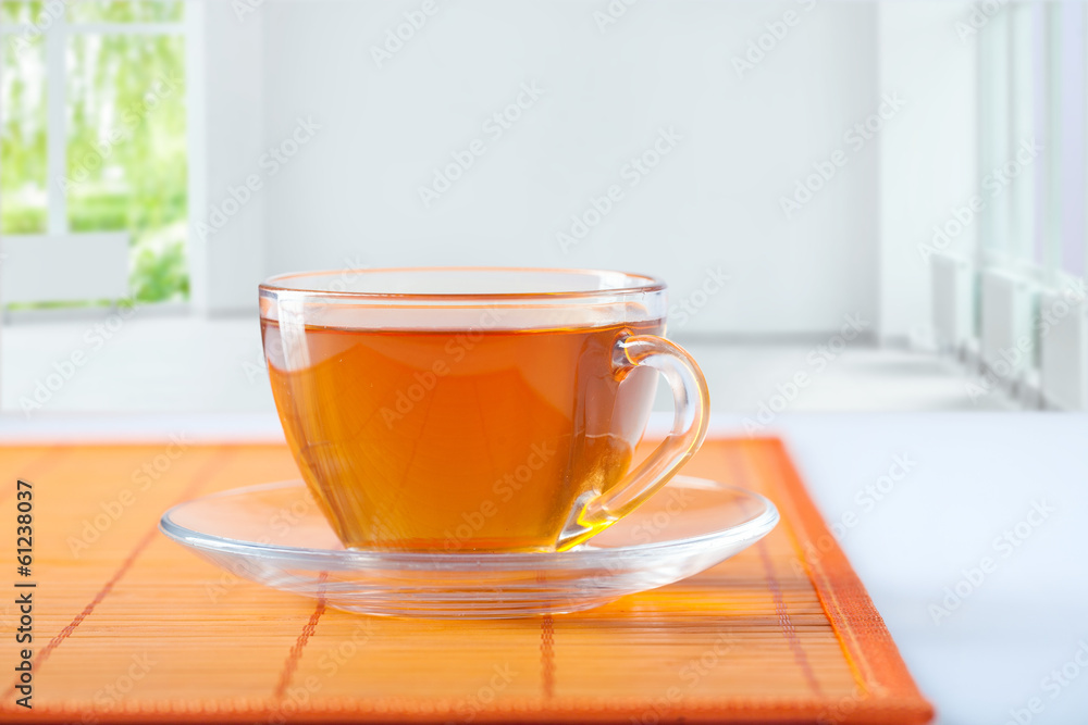 cup of tea on table in empty room