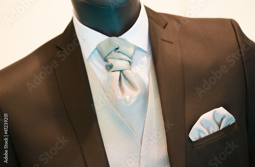 Groom's wedding suit detail on a mannequin photo