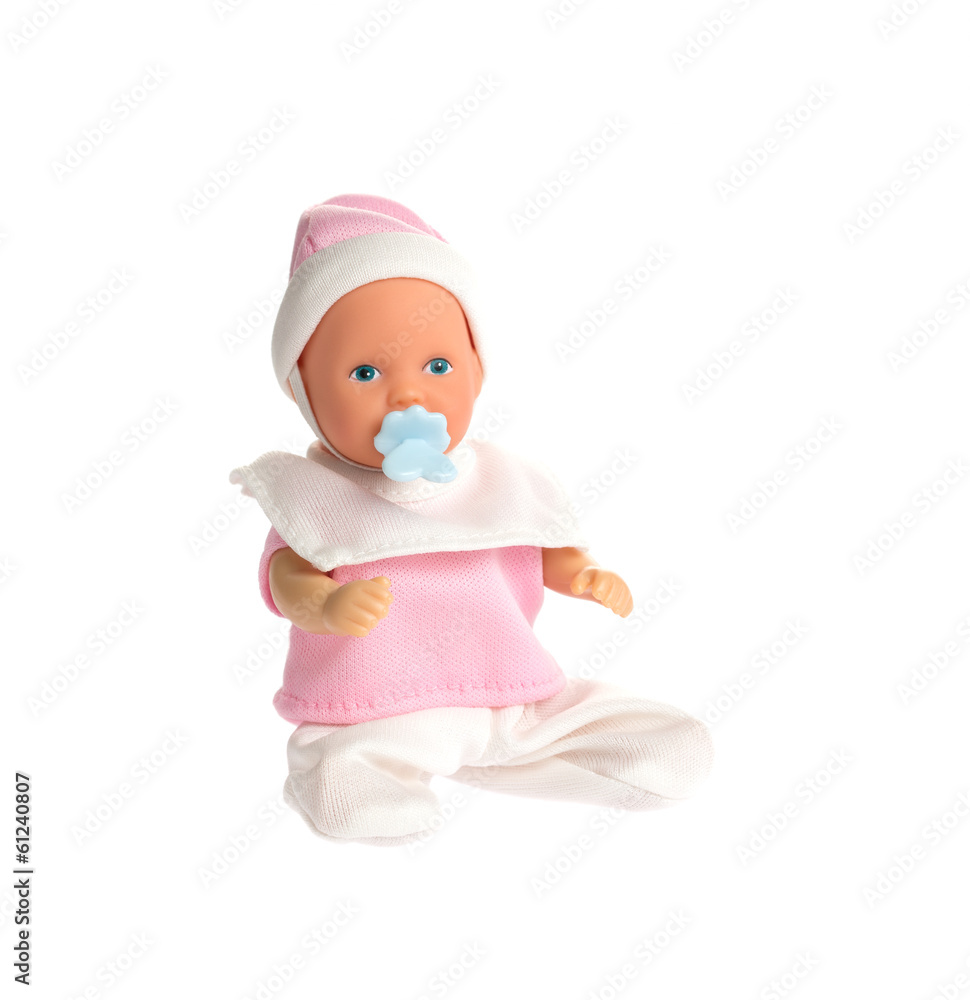 Baby doll in pink clothes isolated on white background Baby doll in pink clothes isolated on white background
