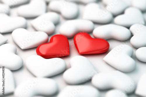 two 3d red hearts on white hearts background