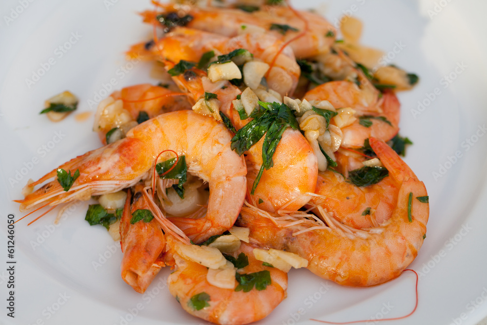 Fried shrimps with the garlic and the parsley Fried shrimps with the garlic and the parsley