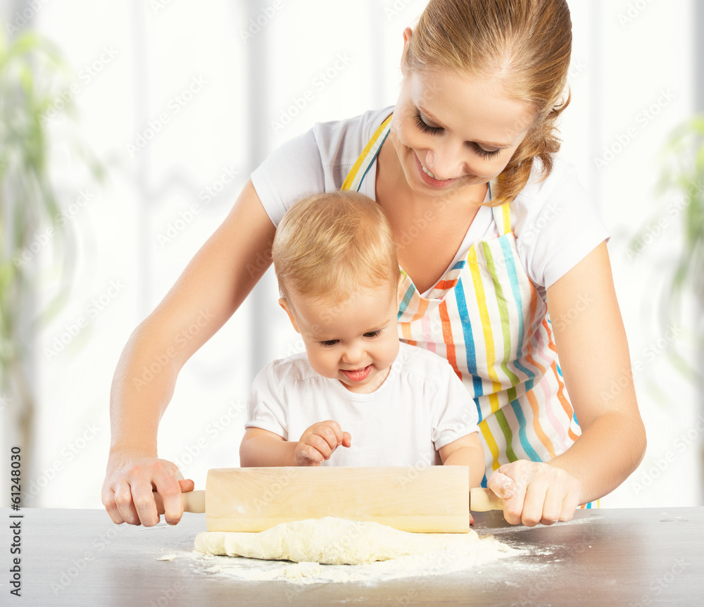 baby girl with her mother cook, bake