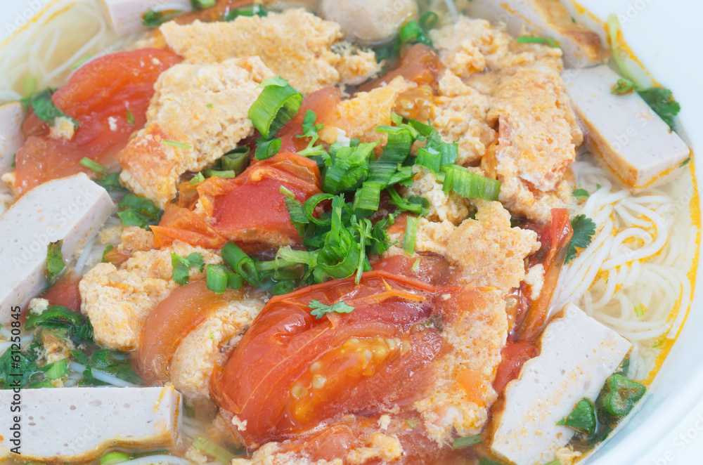 Bun Rieu Meat rice vermicelli soup, served with tomato broth and