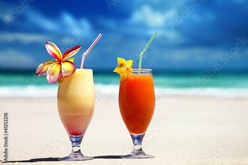 fresh fruit juices on a tropical beach