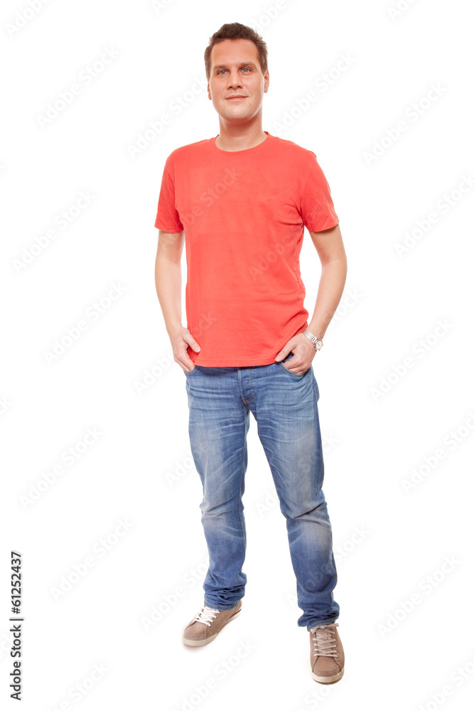 Young man guy red t-shirt jaens with hands in pockets isolated Young man guy red t-shirt jaens with hands in pockets isolated
