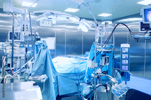 Modern operating room with the patient on the table.