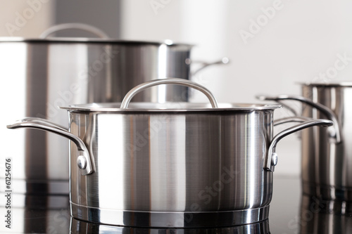 Aluminum pots on the kitchen top