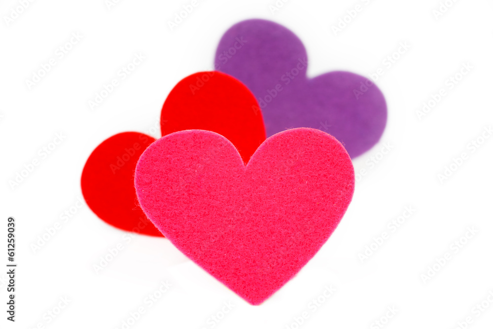 Three colored heart shapes
