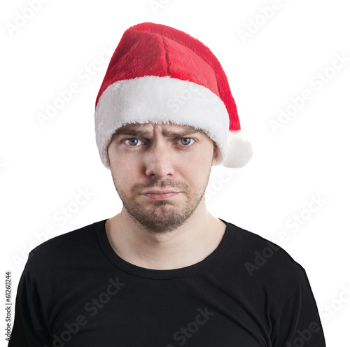 Sad face. Man with a santa hat, isolated on white.
