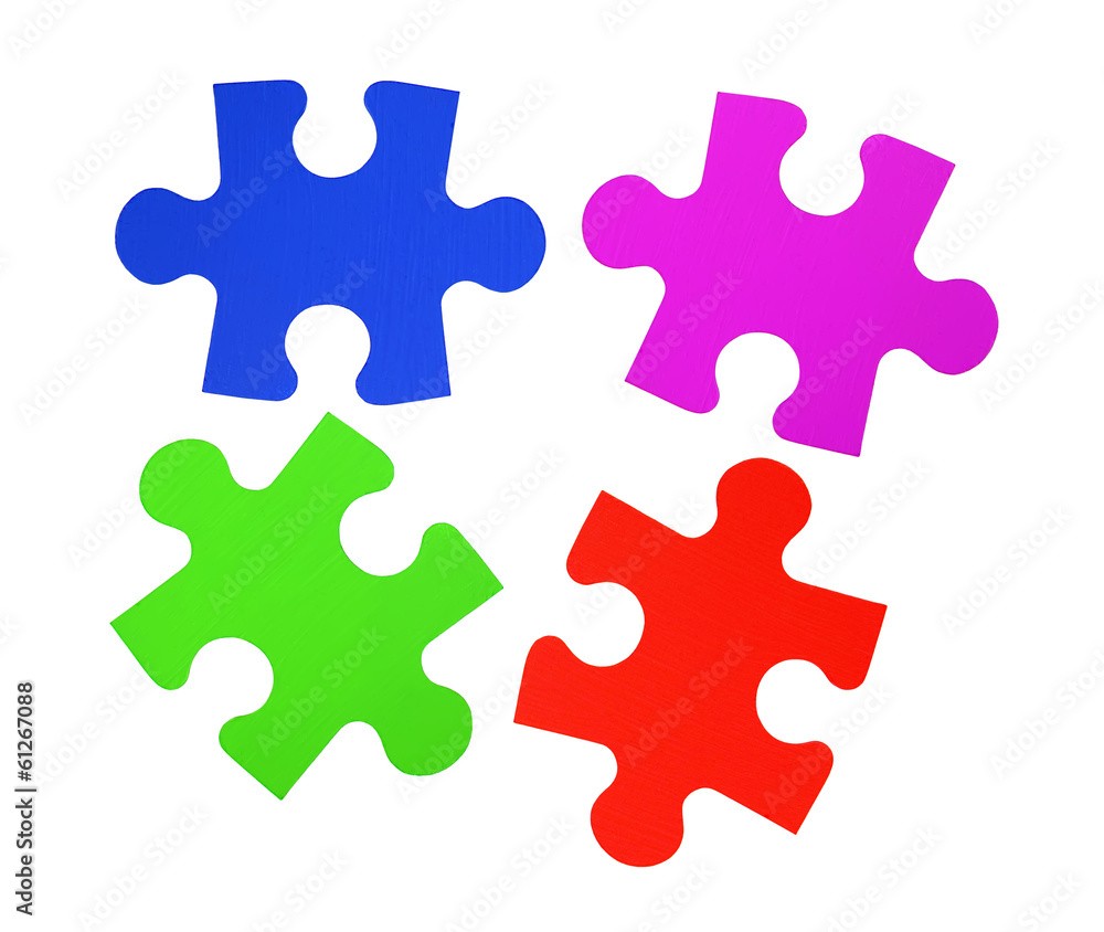 Colorful puzzles closeup isolated on white Colorful puzzles closeup isolated on white