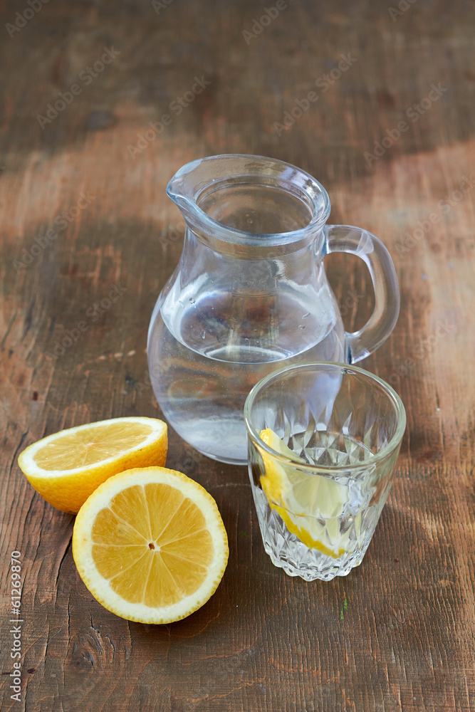 Water in a jug and lemons Water in a jug and lemons