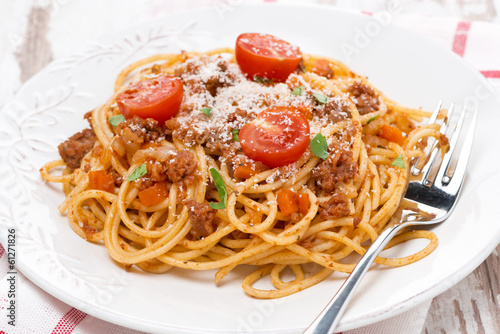 a plate of spaghetti bolognese, close-up