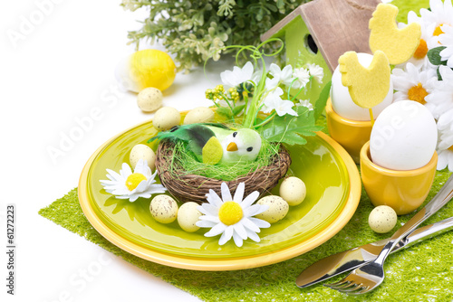 Festive Easter table setting with decorations and flowers