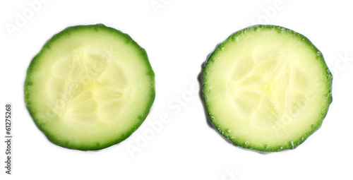 Sliced fresh cucumber, isolated on white