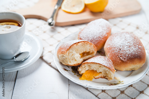 Freshly baked sweet buns with jam