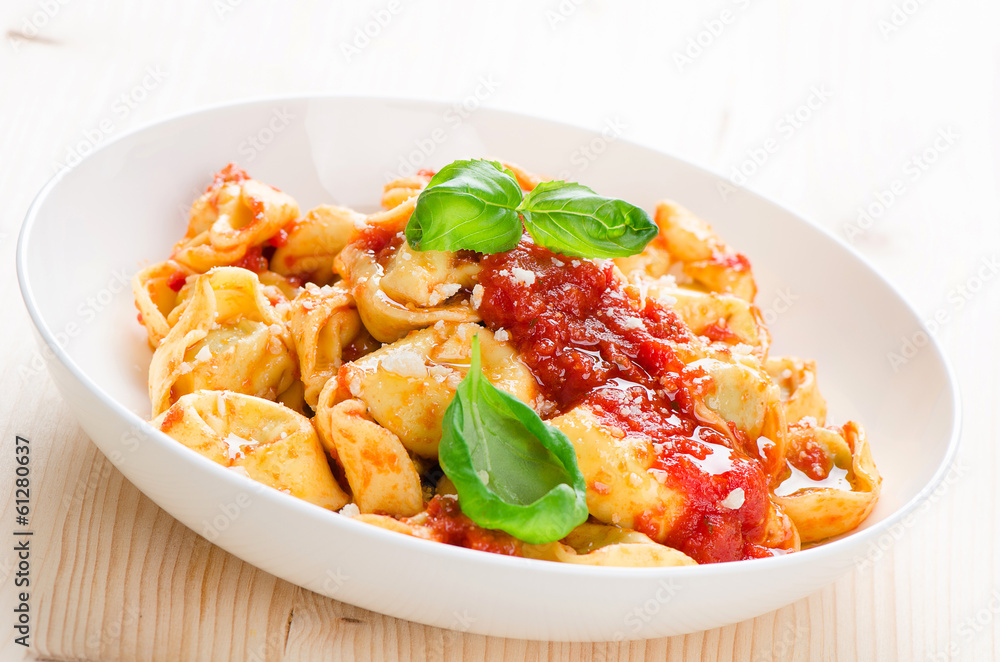 Tortellini with tomato sauce and cheese Tortellini with tomato sauce and cheese