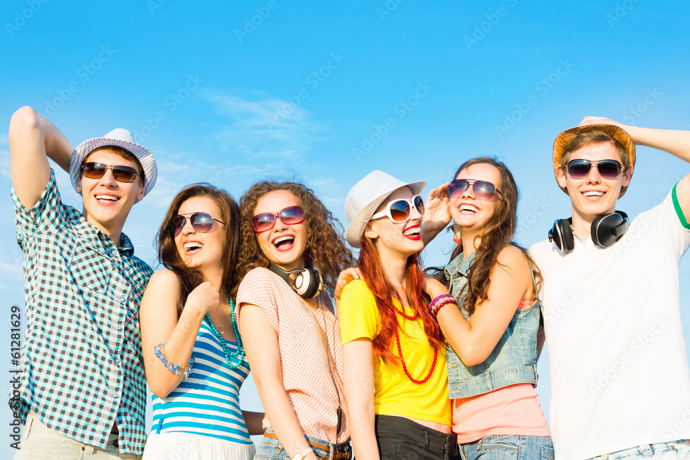 group of young people wearing sunglasses and hat group of young people wearing sunglasses and hat