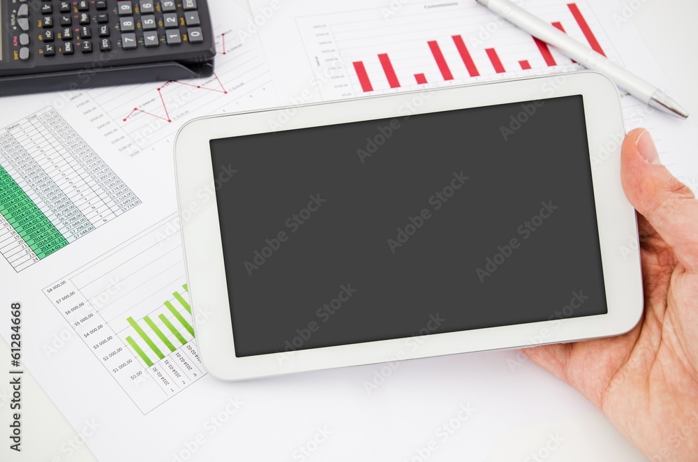 Tablet pc with blank screen. Modern workplace in office Tablet pc with blank screen. Modern workplace in office