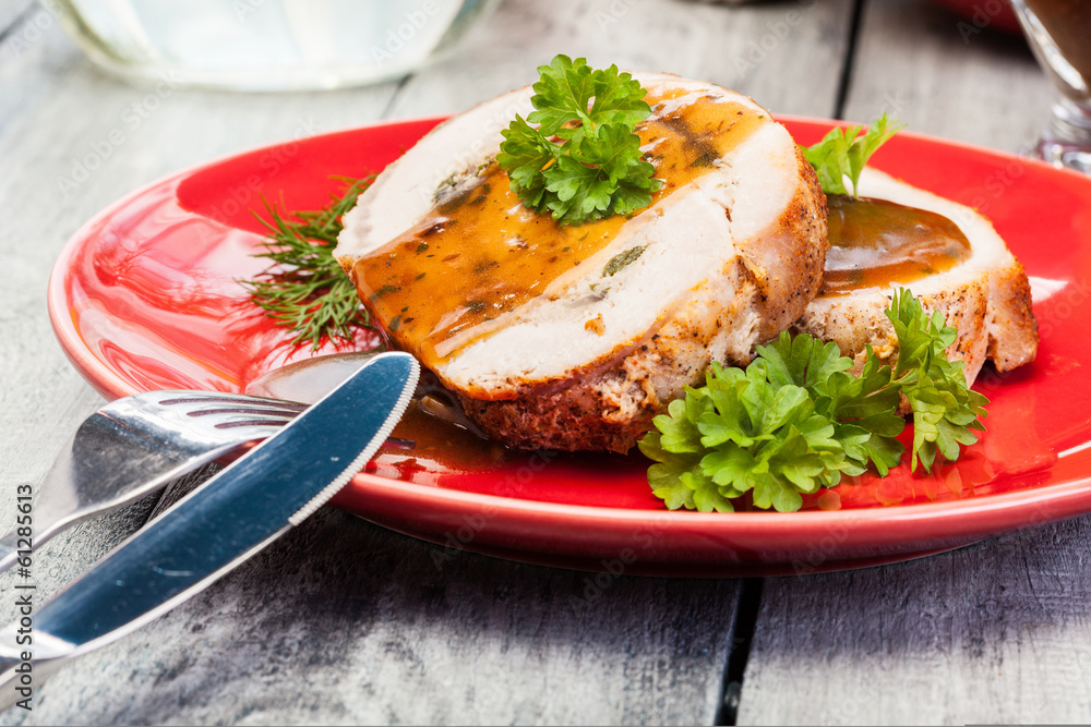 Sliced pork lion roll stuffed with mushrooms