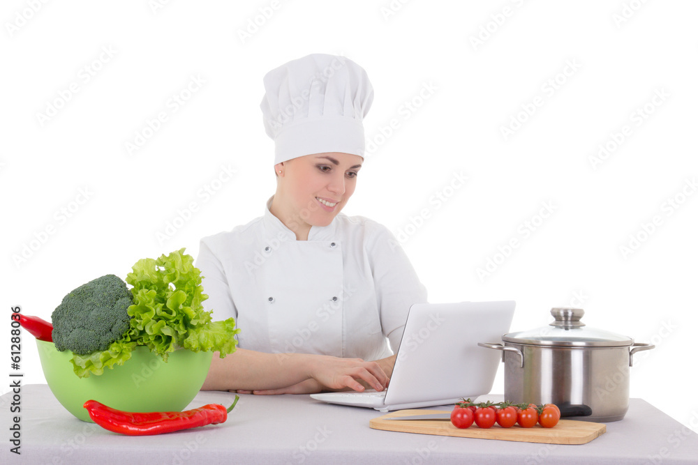 portrait of attractive cook woman in uniform sitting at the kitc portrait of attractive cook woman in uniform sitting at the kitc