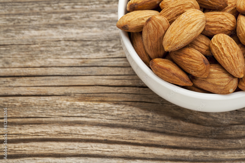 almond nuts in a bowl almond nuts in a bowl