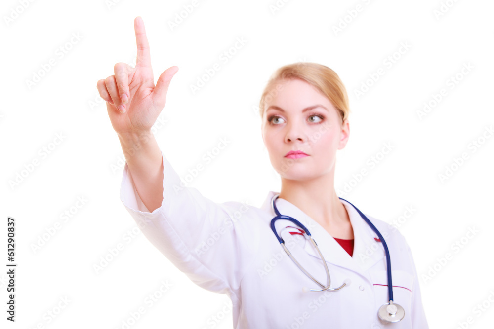 Woman doctor or nurse in lab coat pointing blank copy space Woman doctor or nurse in lab coat pointing blank copy space
