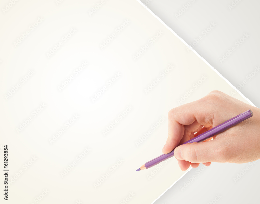 Human hand drawing with pencil on empty paper template Human hand drawing with pencil on empty paper template